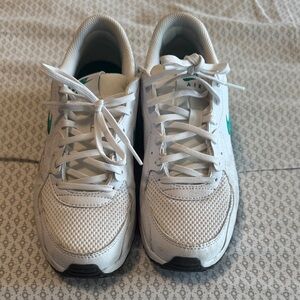 Nike White Athletic Sneakers with Green Swoosh